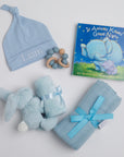 BOXFOX New Baby Boy Box including a swaddle, bunny soother, teether, hat, and book.