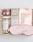 BOXFOX Pink Pamper Gift Box with mini tin candle, bath salts, milk chocolate bar, sheet mask, and silk sleep mask