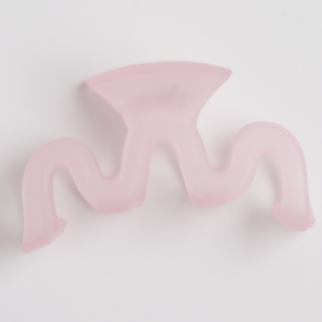 Pink Squiggle Hair Clip on white background