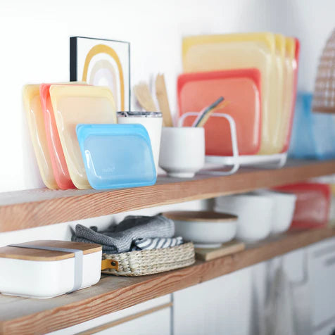 BLUE SNACK SIZE REUSABLE BAG on kitchen shelf.