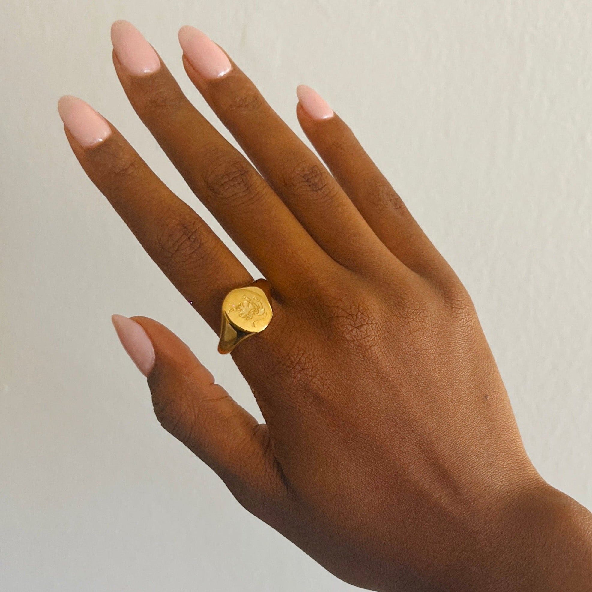 hand with gold ring