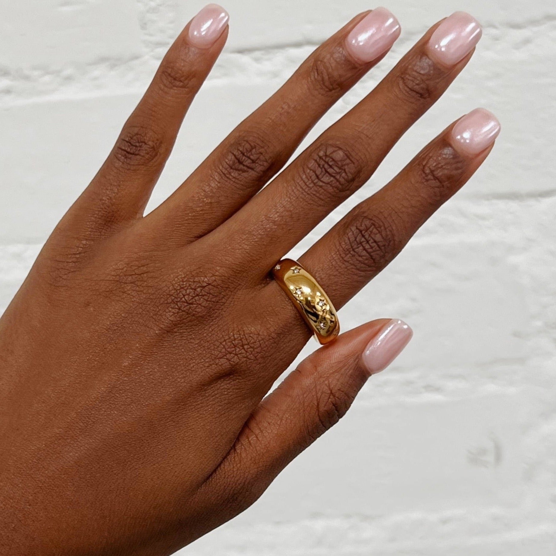 Girl wearing gold ring