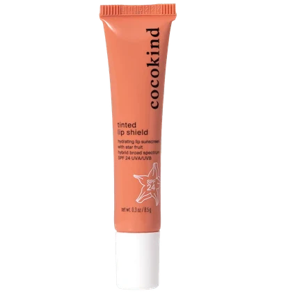 cocokind Tinted Lip Shield coral tube